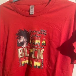 I am a black man red t shirt with words of affirmation on it.